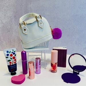 White Mini Handbag with Purple Pom Pom